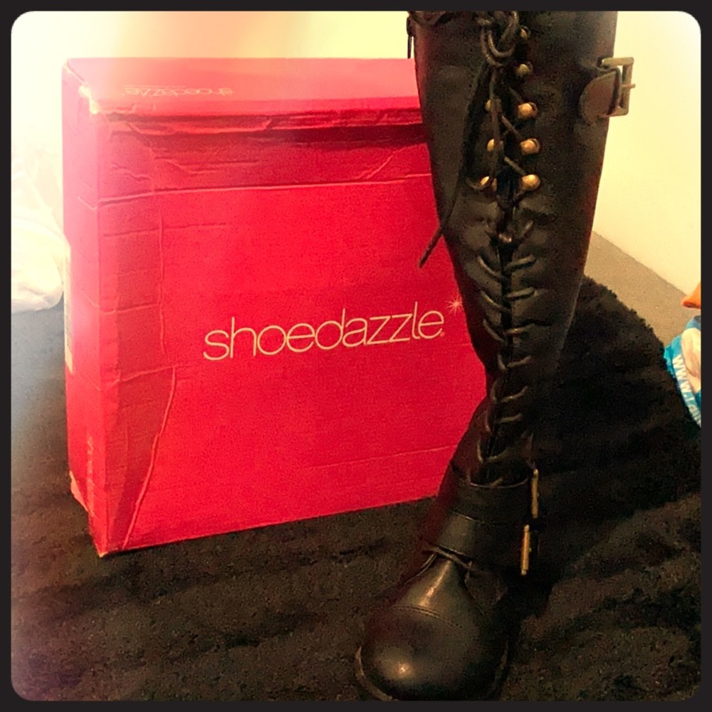 Black flat high lace up boots